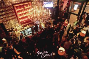 A bird's eye view of people drinking in one of the top 10 Newcastle bars, Passing Clouds