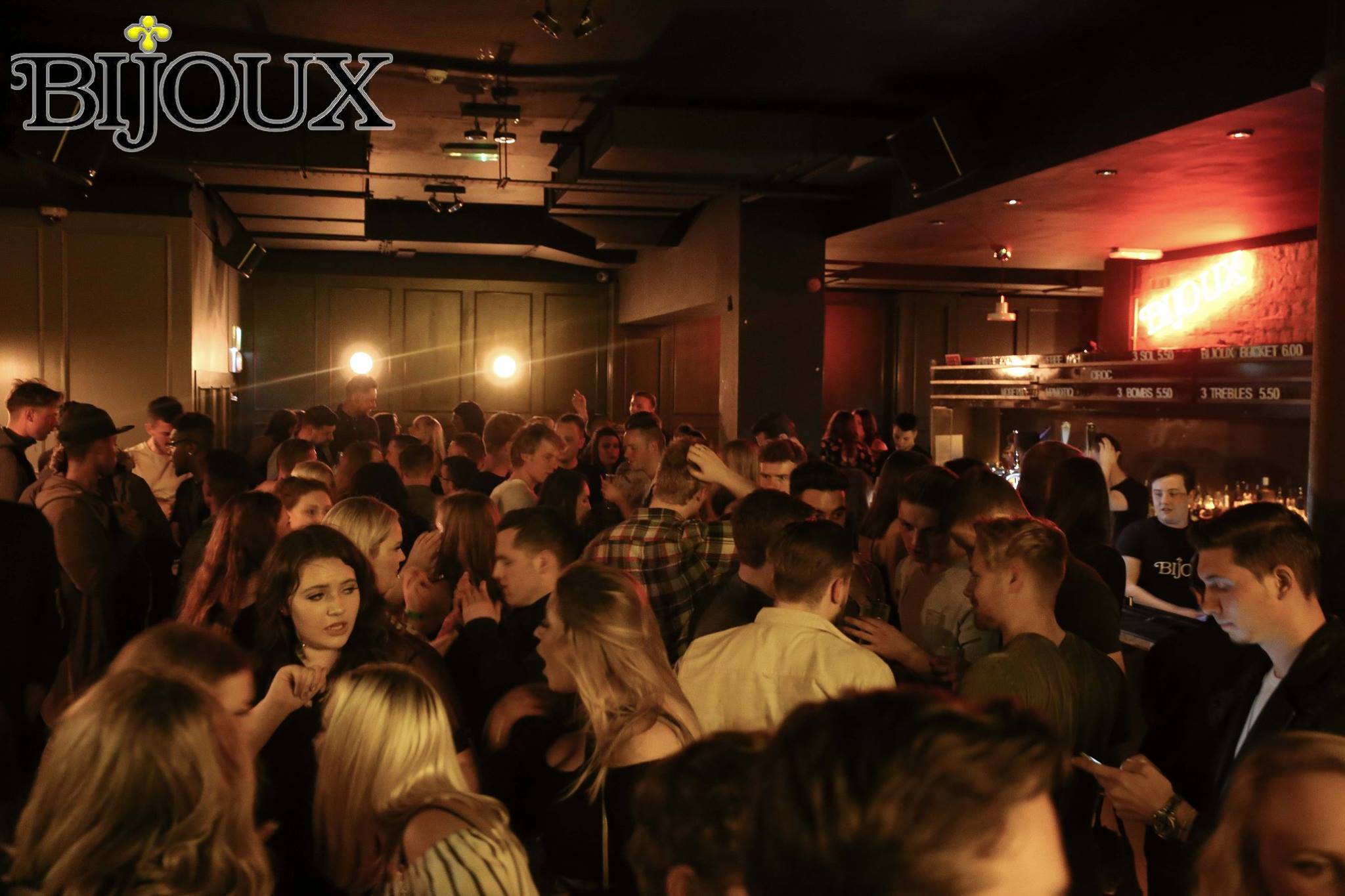 Bijoux Bar Review, with an image of people on the dance floor at Bijoux