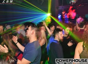 People partying under bright lights in Newcastle's Powerhouse nightclub